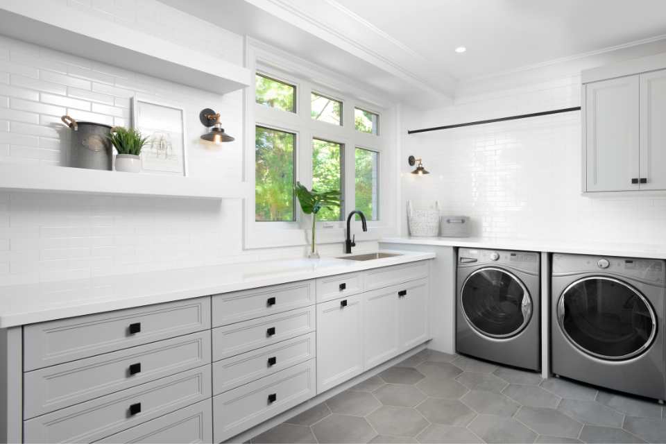grey hexagon large format tile floor in laundry mudroom with farmhouse style 